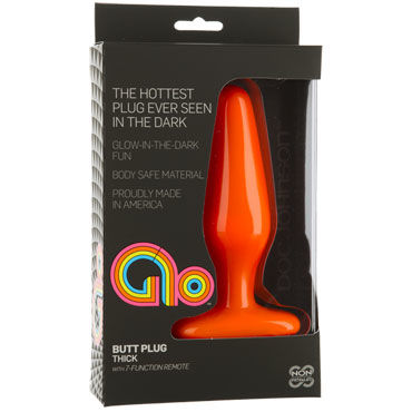Doc Johnson GLO Vibrating Thick, оранжевая - Анальная пробка с вибрацией, светящаяся в темноте - купить в секс шопе